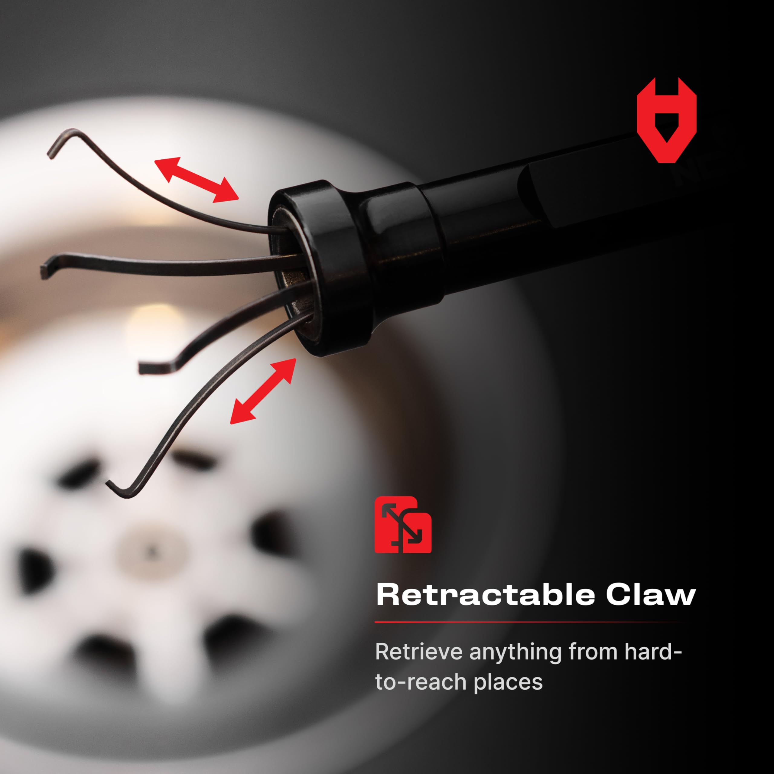NoCry four-finger retractable claw grips metal and non-metal objects securely.