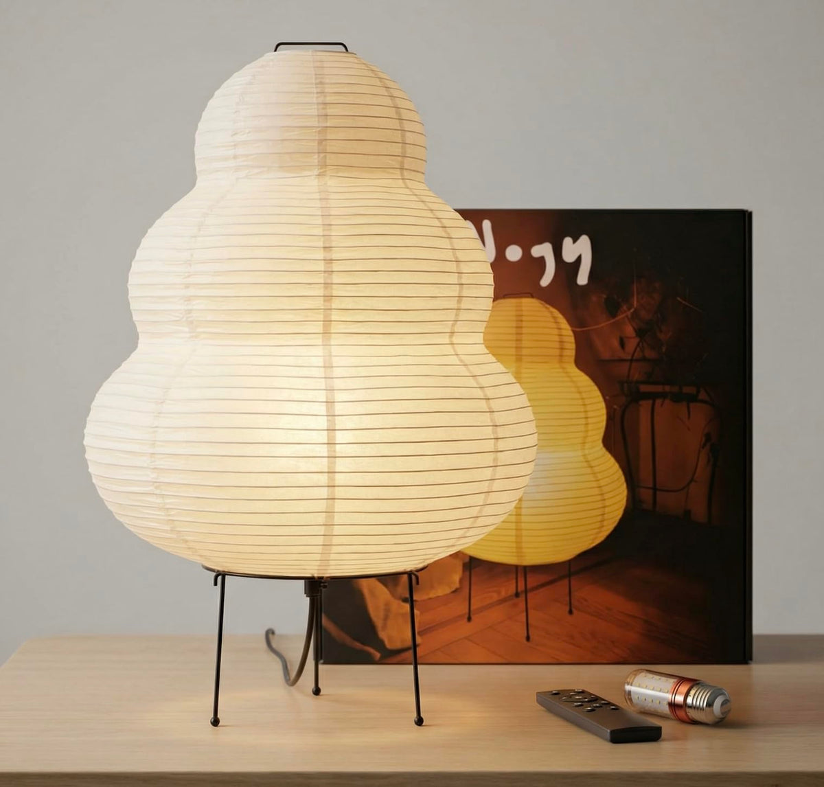 Nogy Akari rice paper lamp shade close-up showing delicate texture and warm glow.