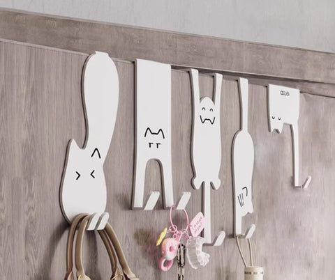 Nooboochichy cat-shaped door hooks in white offer space-saving entryway storage.