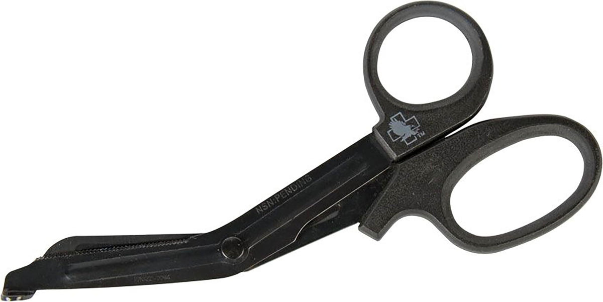 North American Rescue trauma shear closeup blade with serrated edge for fast cuts.