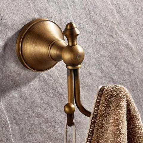 NSCMQSL double-brushed brass hook closeup for towels, robes, or bags.