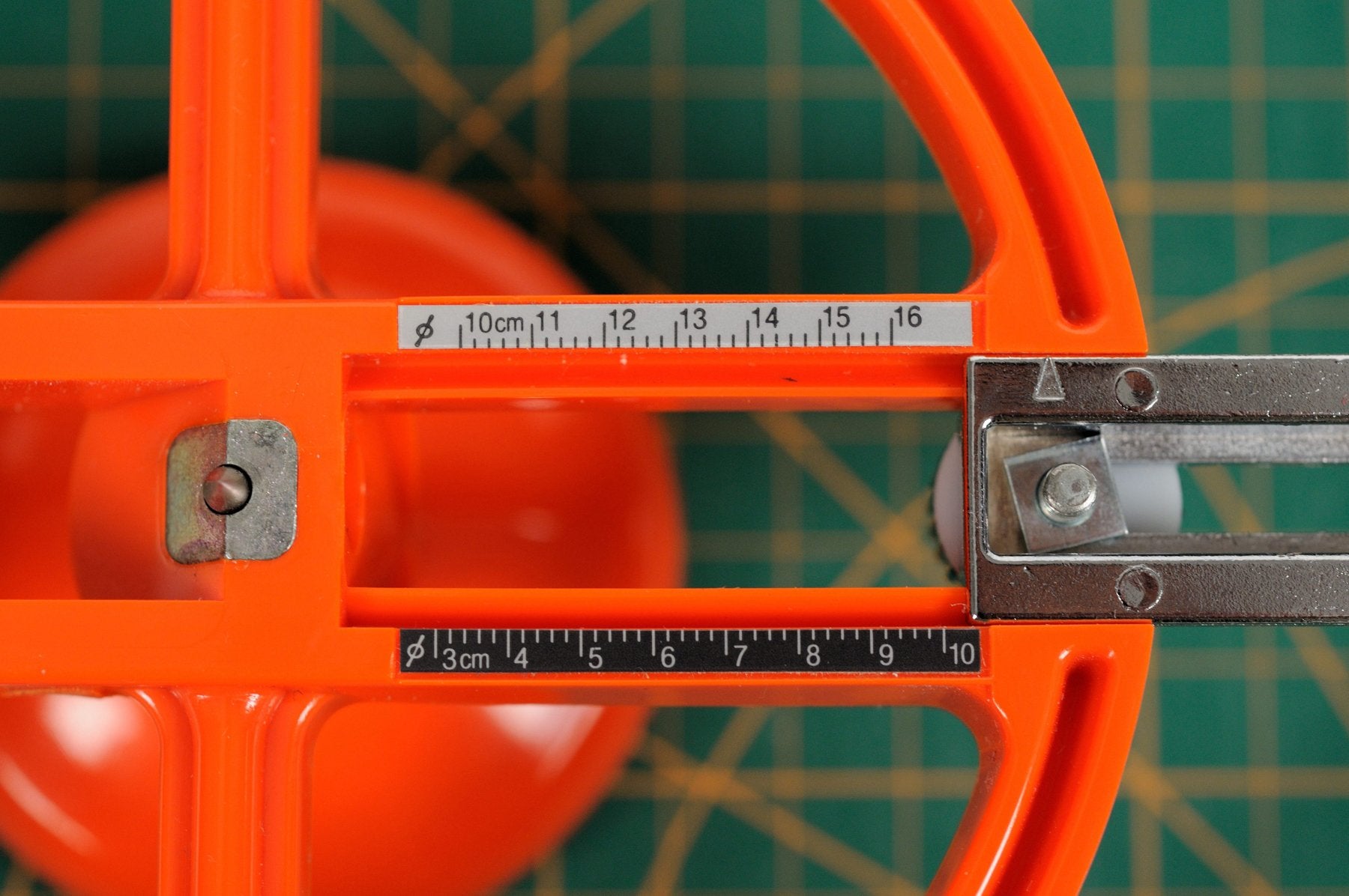 NT Cutter used on ceiling tile for accurate round cuts.