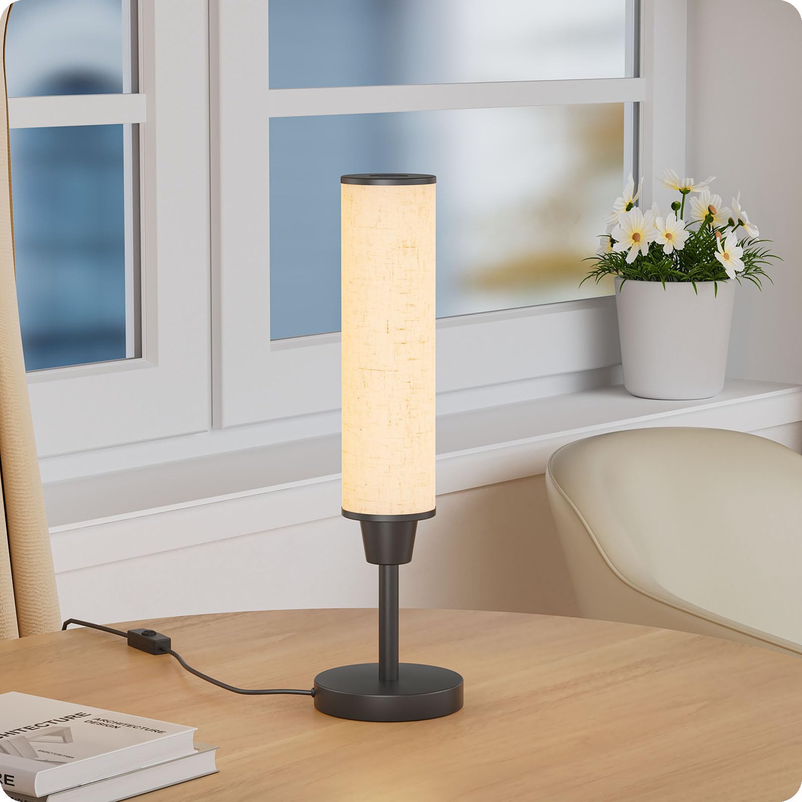 Nukanu lamp with dimmed warm light, suited for reading at night.