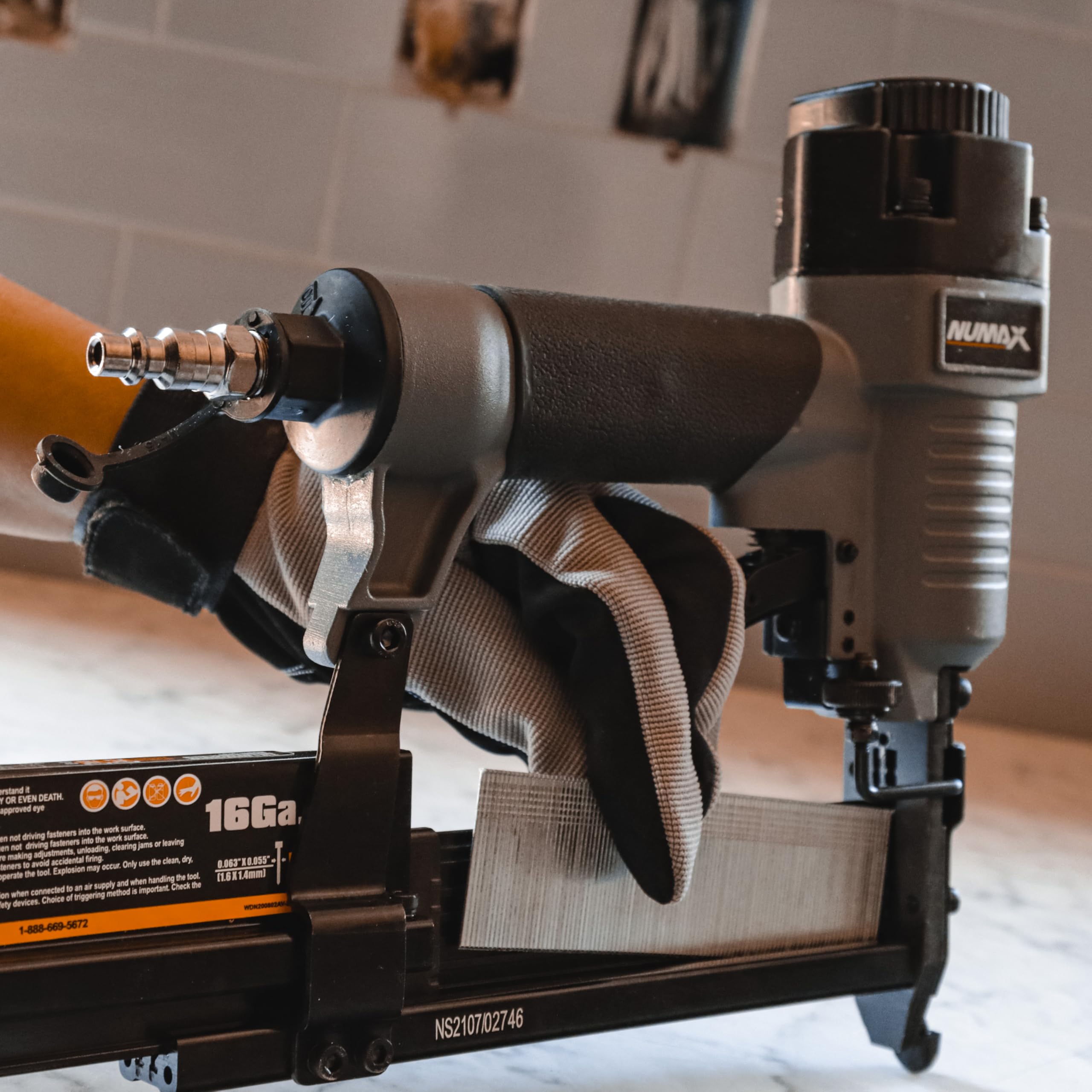 NuMax SL31 comfort grip and exhaust directing air away from the user