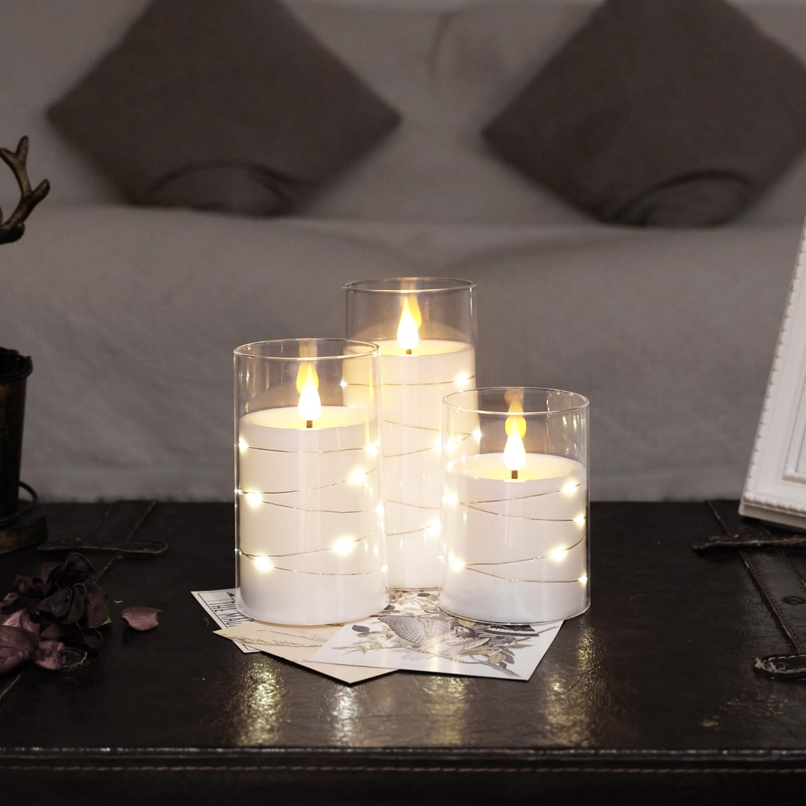NURADA candle on fireplace creating warm glow