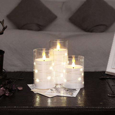 NURADA candle on fireplace creating warm glow