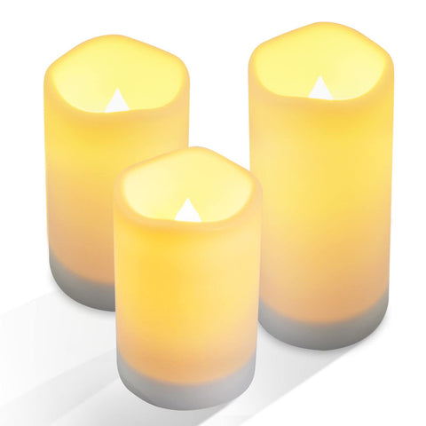 NURADA outdoor solar candles on patio setup with warm, sun-powered glow.