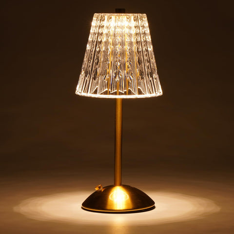 Nusogon cordless table lamp with crystal shade for warm, elegant ambiance.