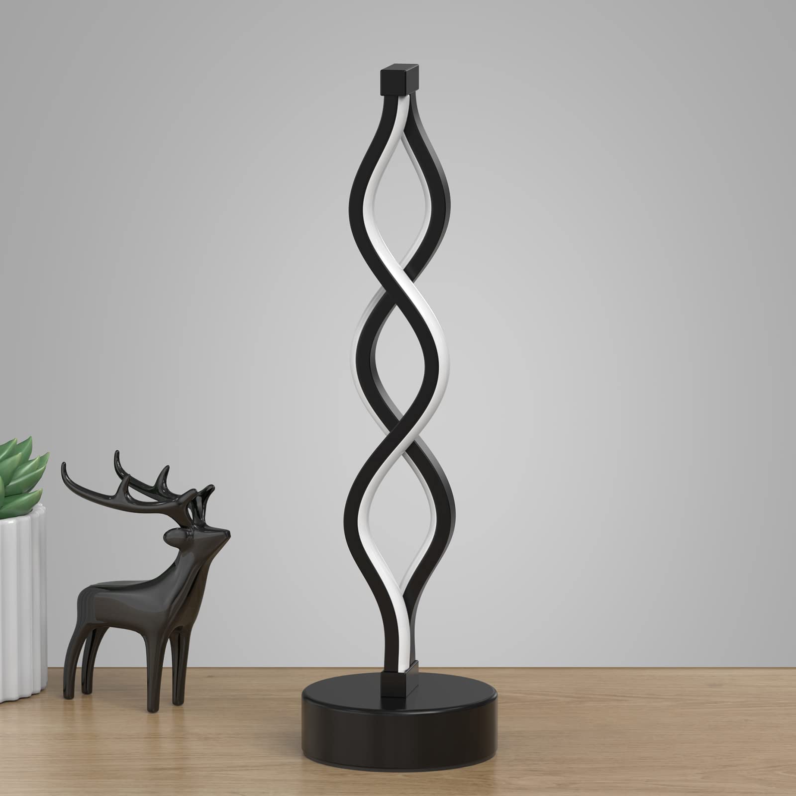NUÜR Infinity Spiral lamp arc silhouette showcases sleek bedside lighting