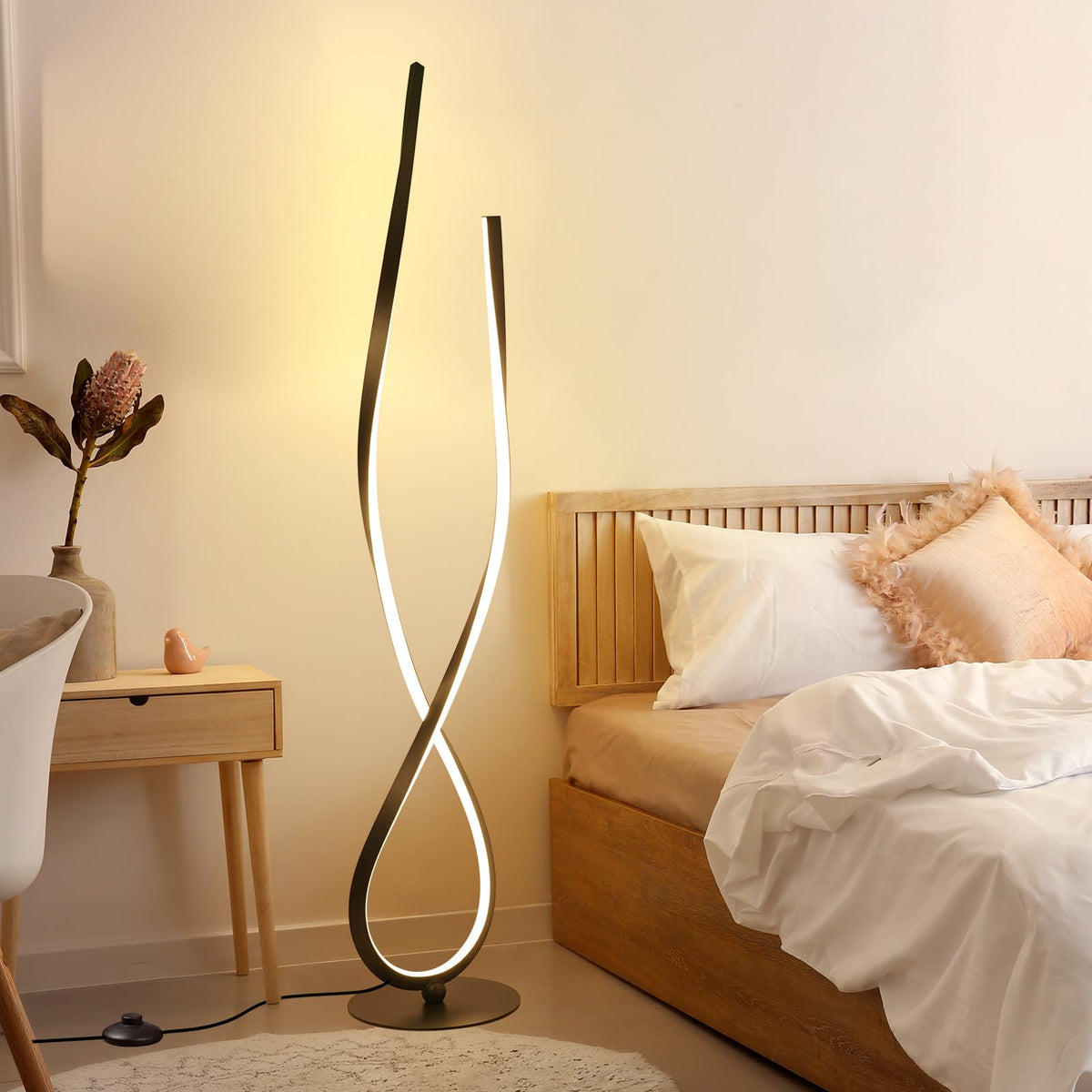 NUÜR Modern Spiral LED Floor Lamp arc view brightens living room reading area.