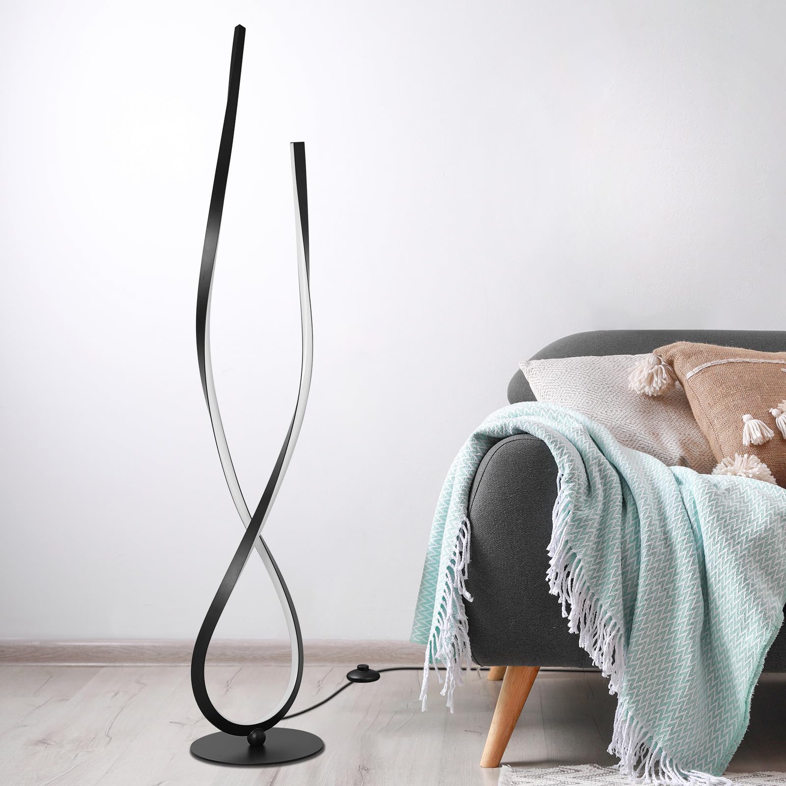 NUÜR Spiral LED Floor Lamp provides living room ambience with adjustable brightness.