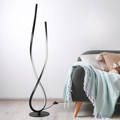 NUÜR Spiral LED Floor Lamp provides living room ambience with adjustable brightness.