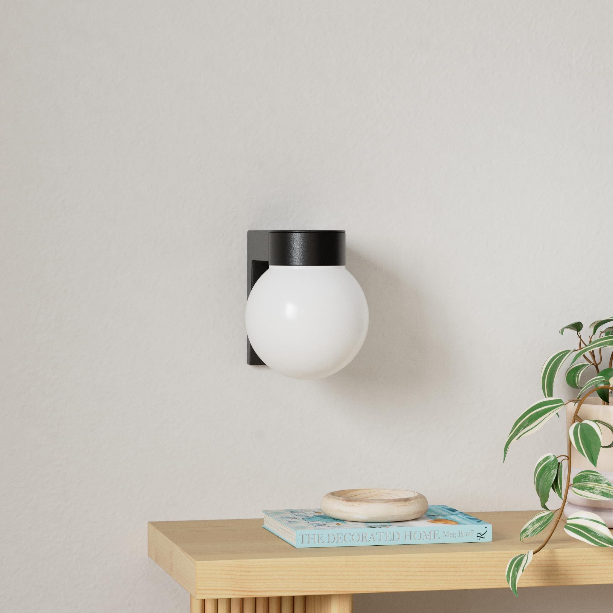 Nuvo SF77/140 black finish exterior wall light complements modern exteriors.