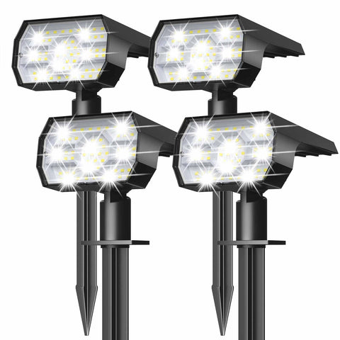 NYMPHY outdoor solar lights along a garden path illuminate walkways with an energy-saving glow.