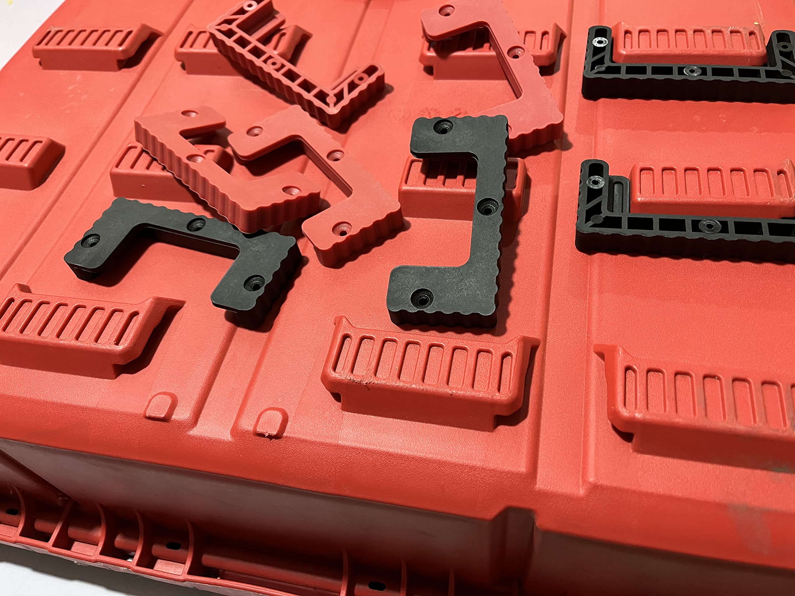 NyVoozy cleat-n-feet set with screws ready for quick mounting in a workshop.