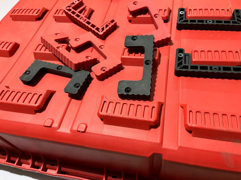 NyVoozy cleat-n-feet set with screws ready for quick mounting in a workshop.