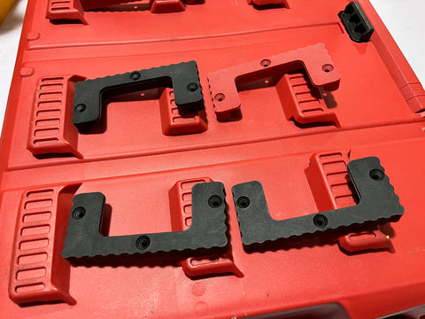 NyVoozy cleats under the workbench keep tools within reach.