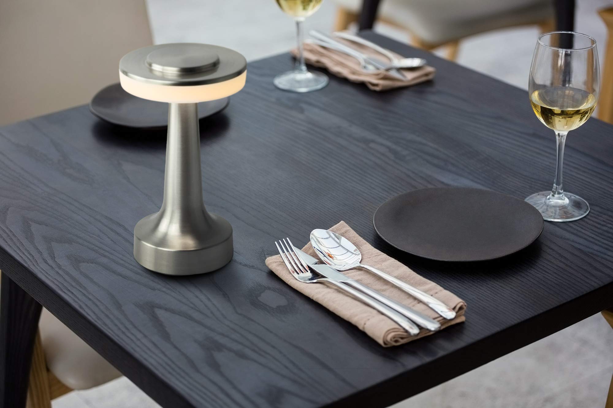 O’Bright lamp in silver finish complements modern bedrooms.