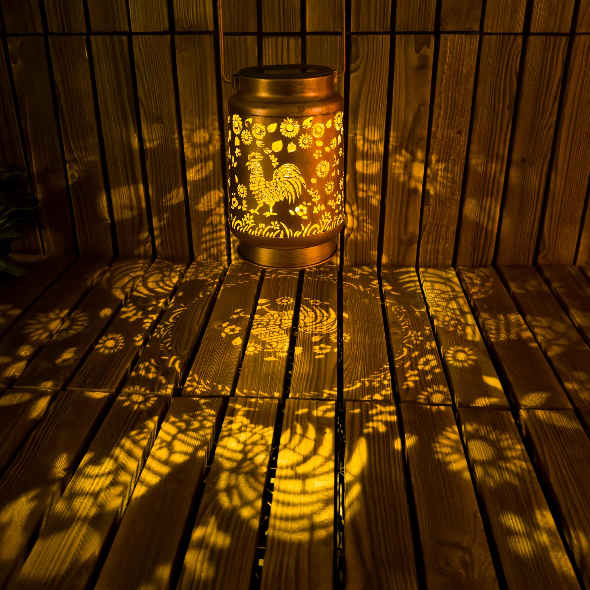 OFEWPAGA chicken solar lantern on lawn creates charming silhouettes after dark.