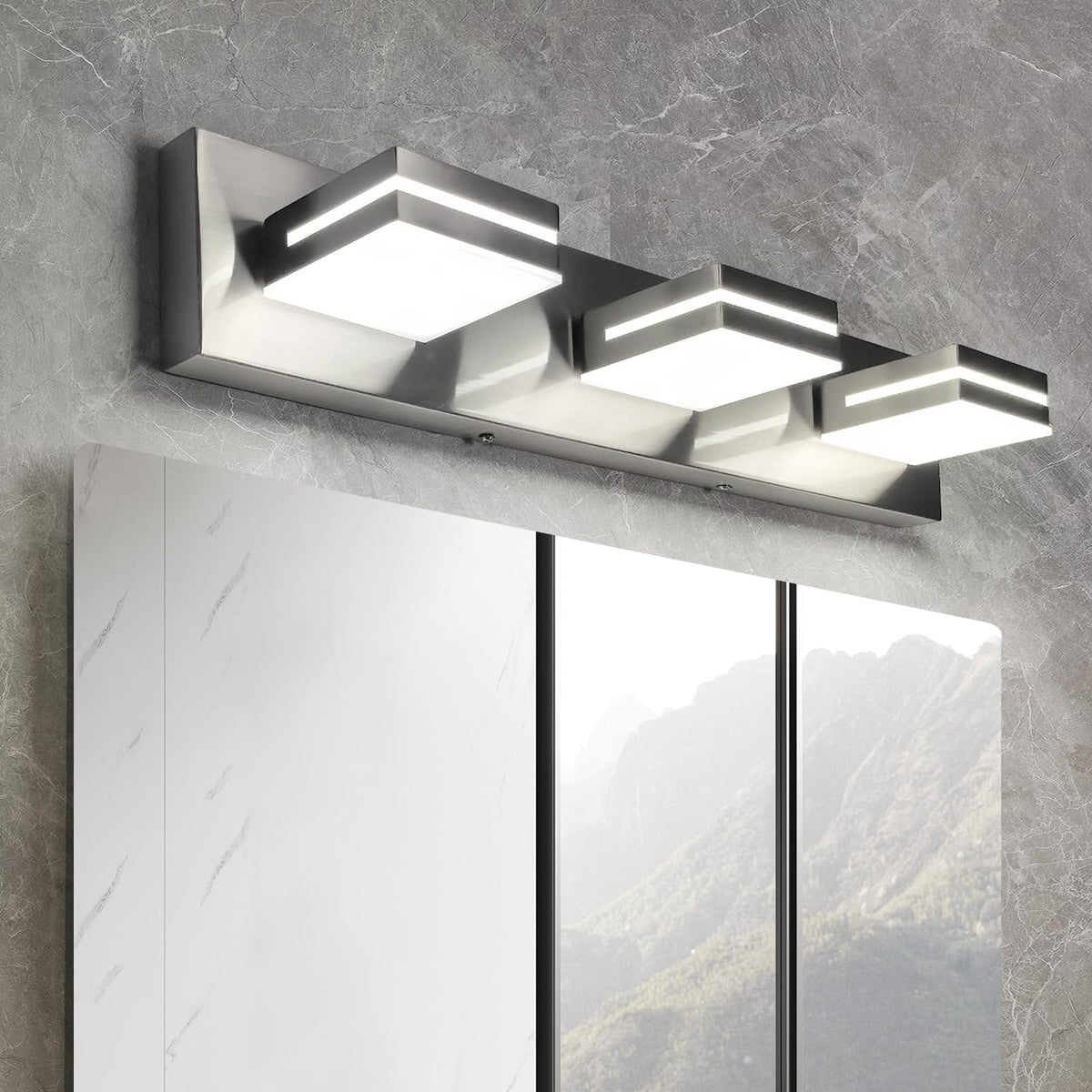 OKELI 3-light vanity fixture in brushed nickel above the mirror for a clean look