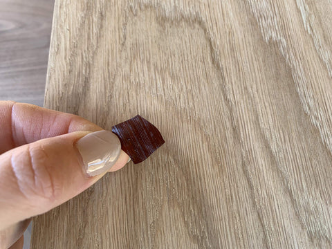 Sealer layer between coats to improve adhesion and clarity.