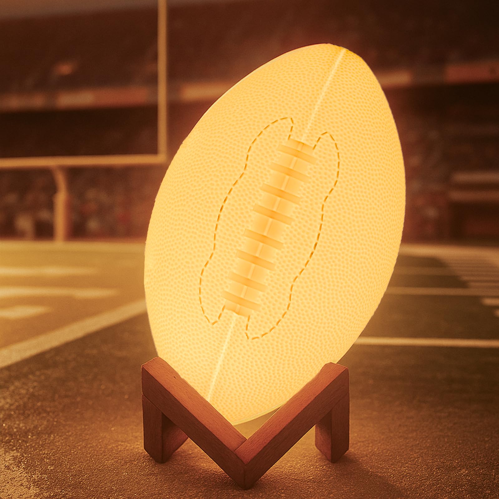 Olee Odee football night light with remote for 16-color bedside ambiance.