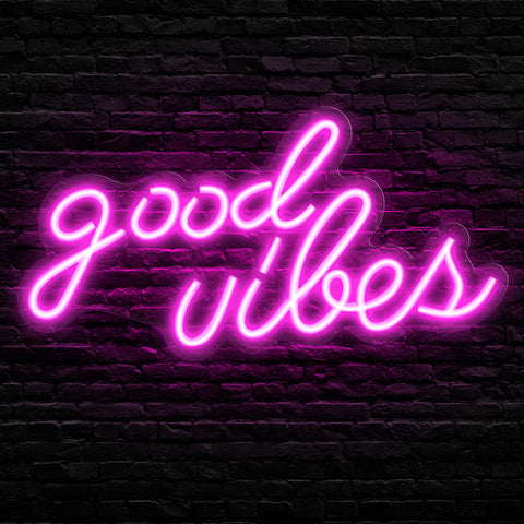 Olekki Pink Good Vibes neon sign mounted on wall for vibrant bedroom ambiance.