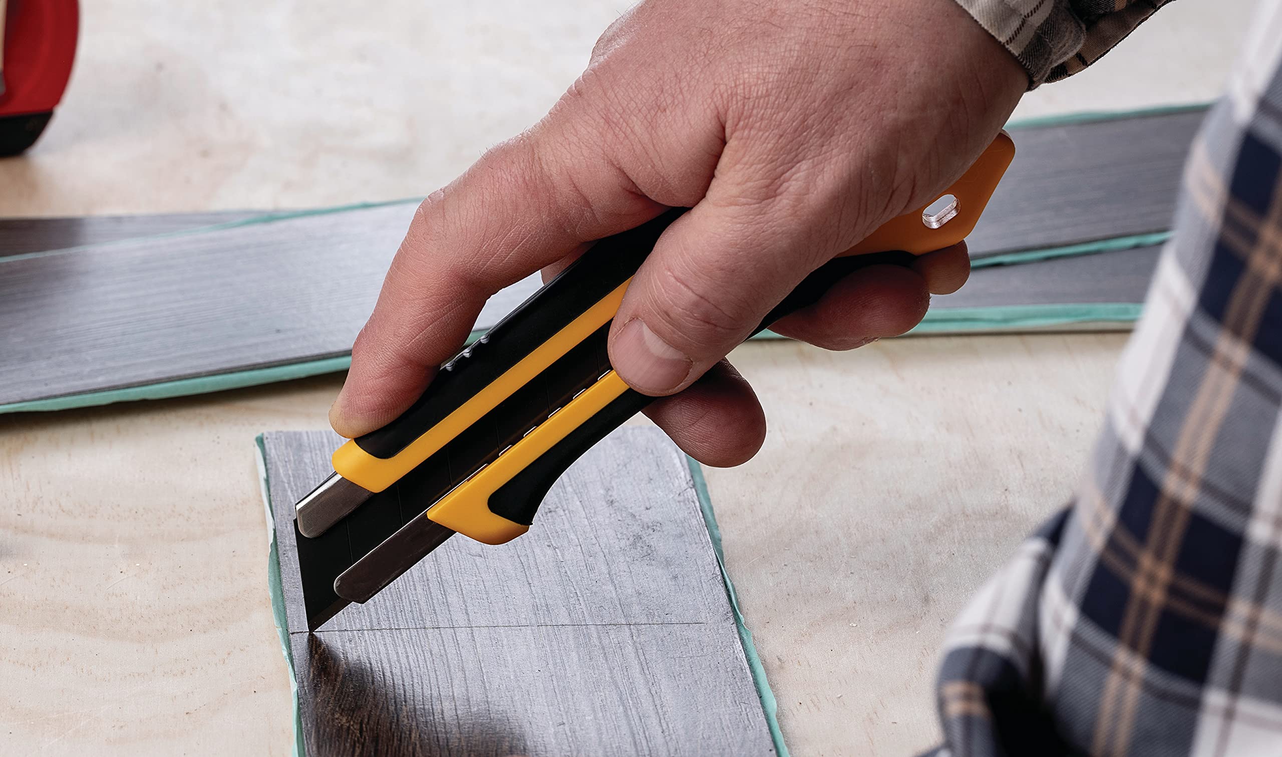 OLFA XH-1 handles tough materials like nylon and laminates.