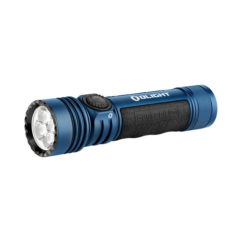 OLIGHT Seeker 4 Pro flashlight outdoors with long-range beam up to 260 meters for night signaling