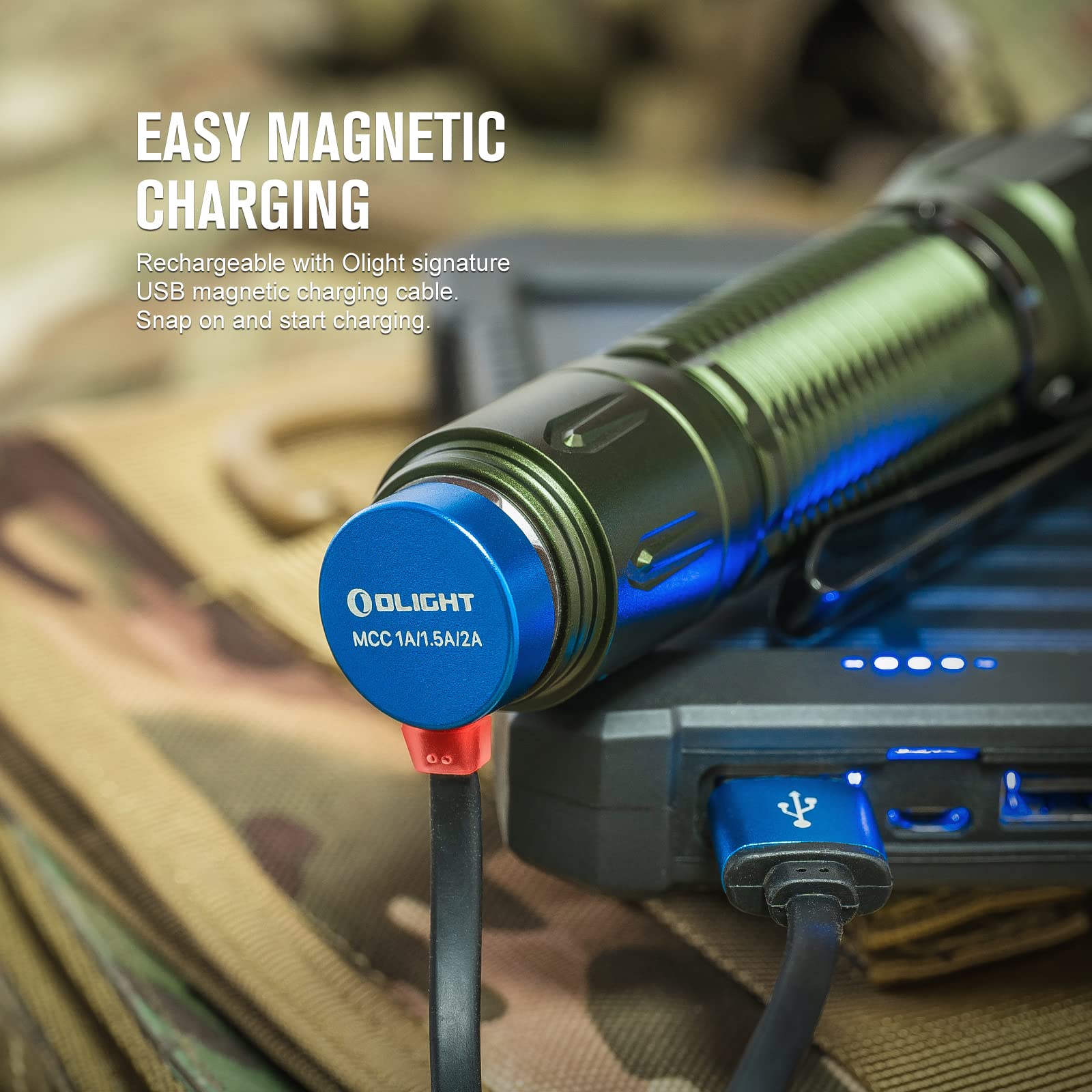 OLIGHT Warrior 3S rechargeable battery indicators around the switch.