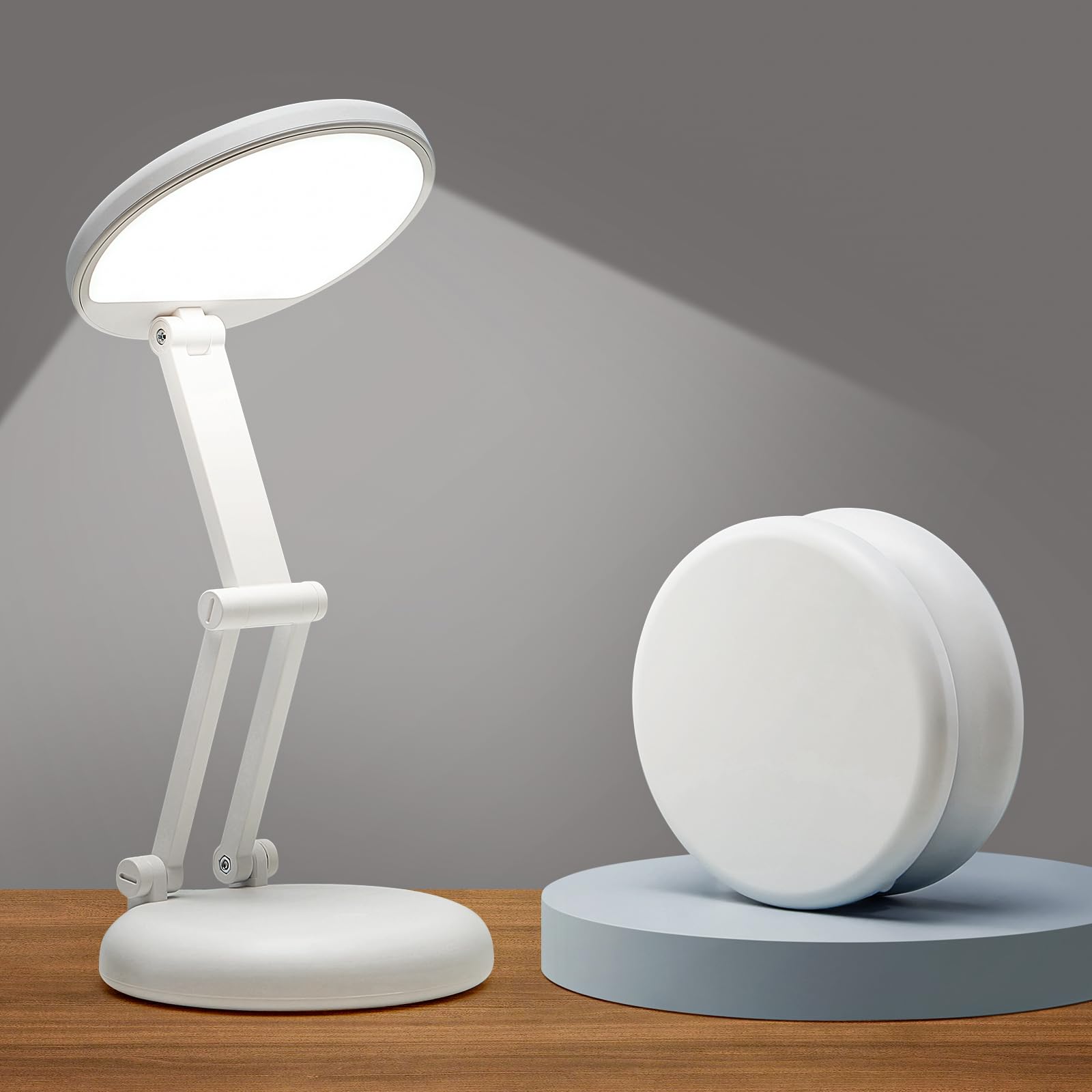 One Fire battery-operated desk lamp folded into a cookie for portability.