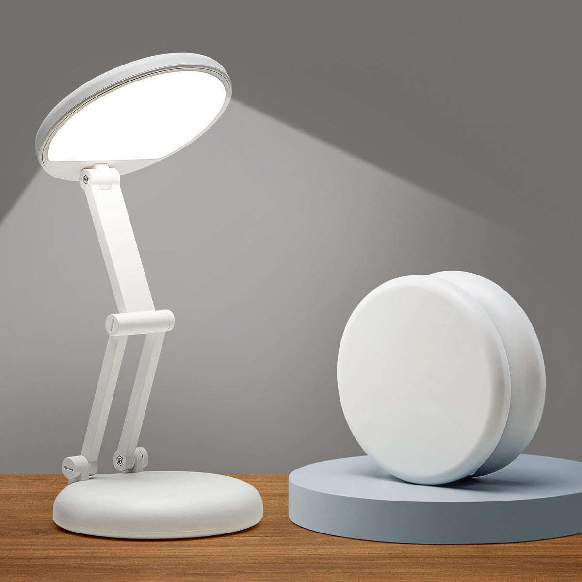 One Fire battery-operated desk lamp folded into a cookie for portability.