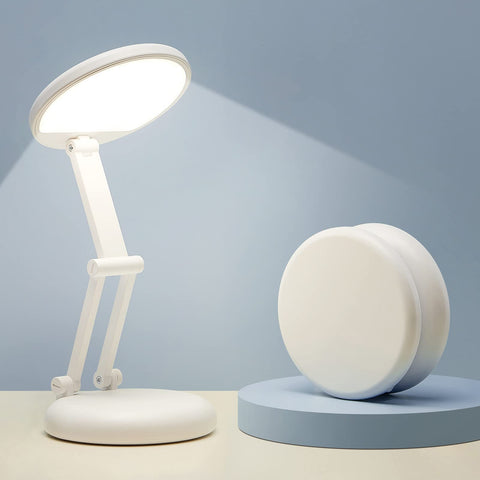 One Fire cordless desk lamp folded into a cookie, travel-friendly for dorm use.