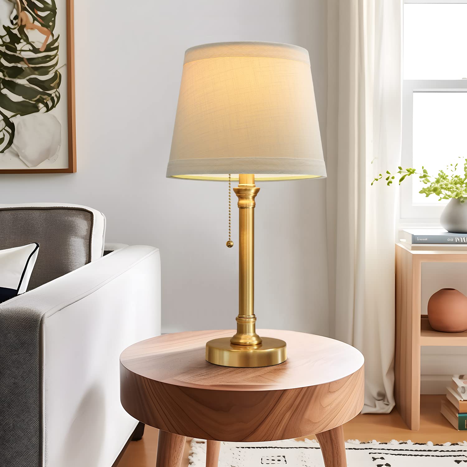 Two-pack Oneach brass table lamps creating balanced symmetry in a room.