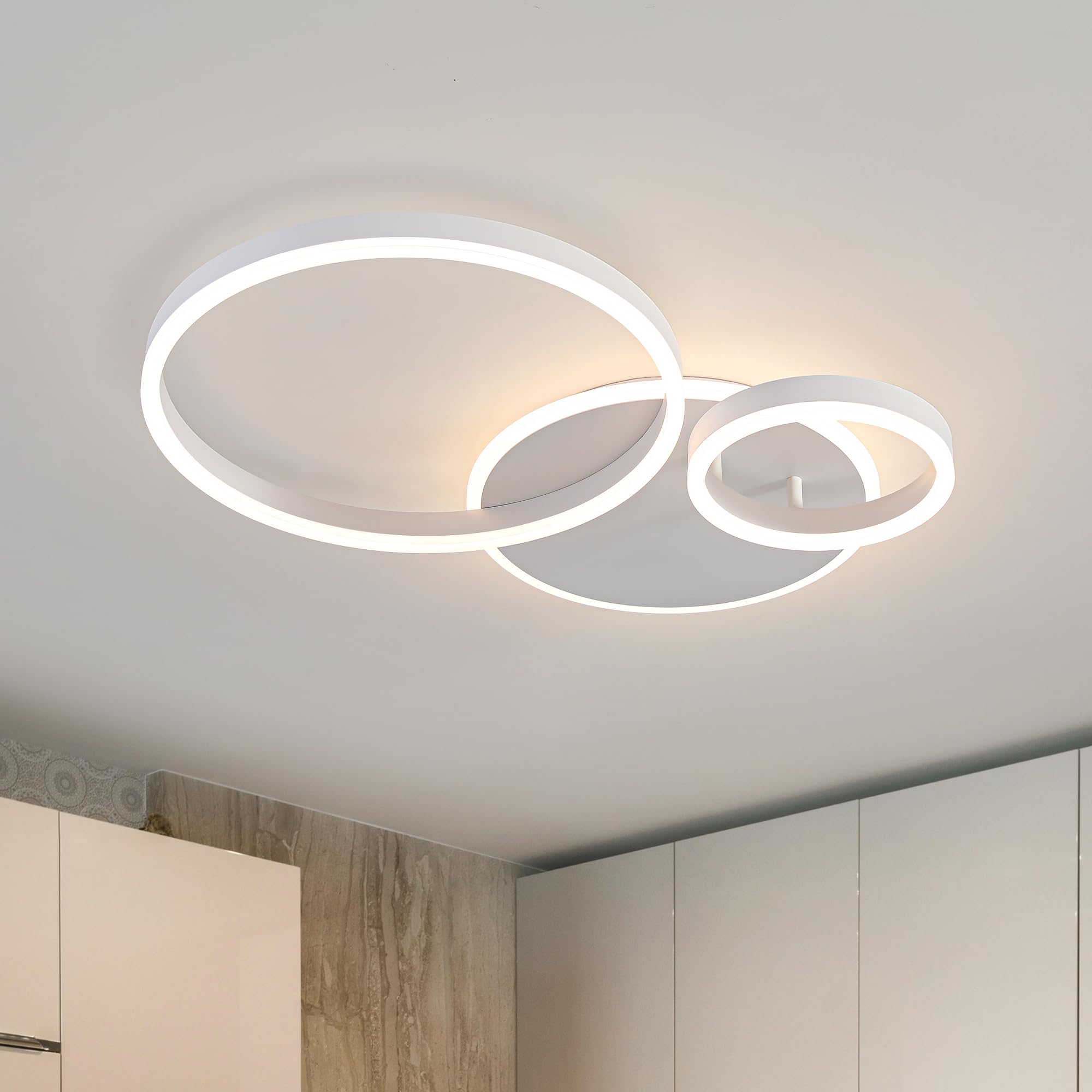 O'NEELDY Modern 3-Ring LED Chandelier design adds a stylish focal point to living spaces.