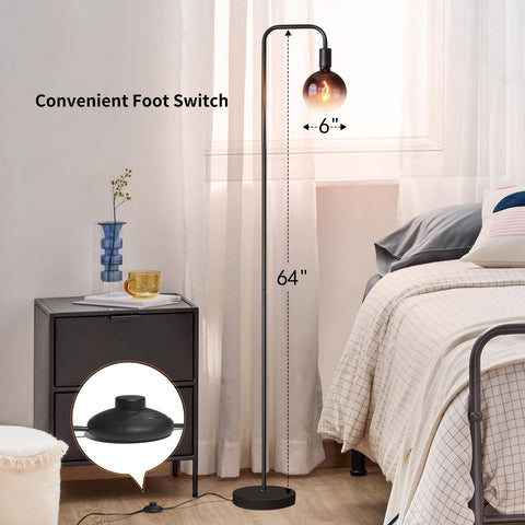 ONEWISH tall lamp beside bed creates cozy reading light