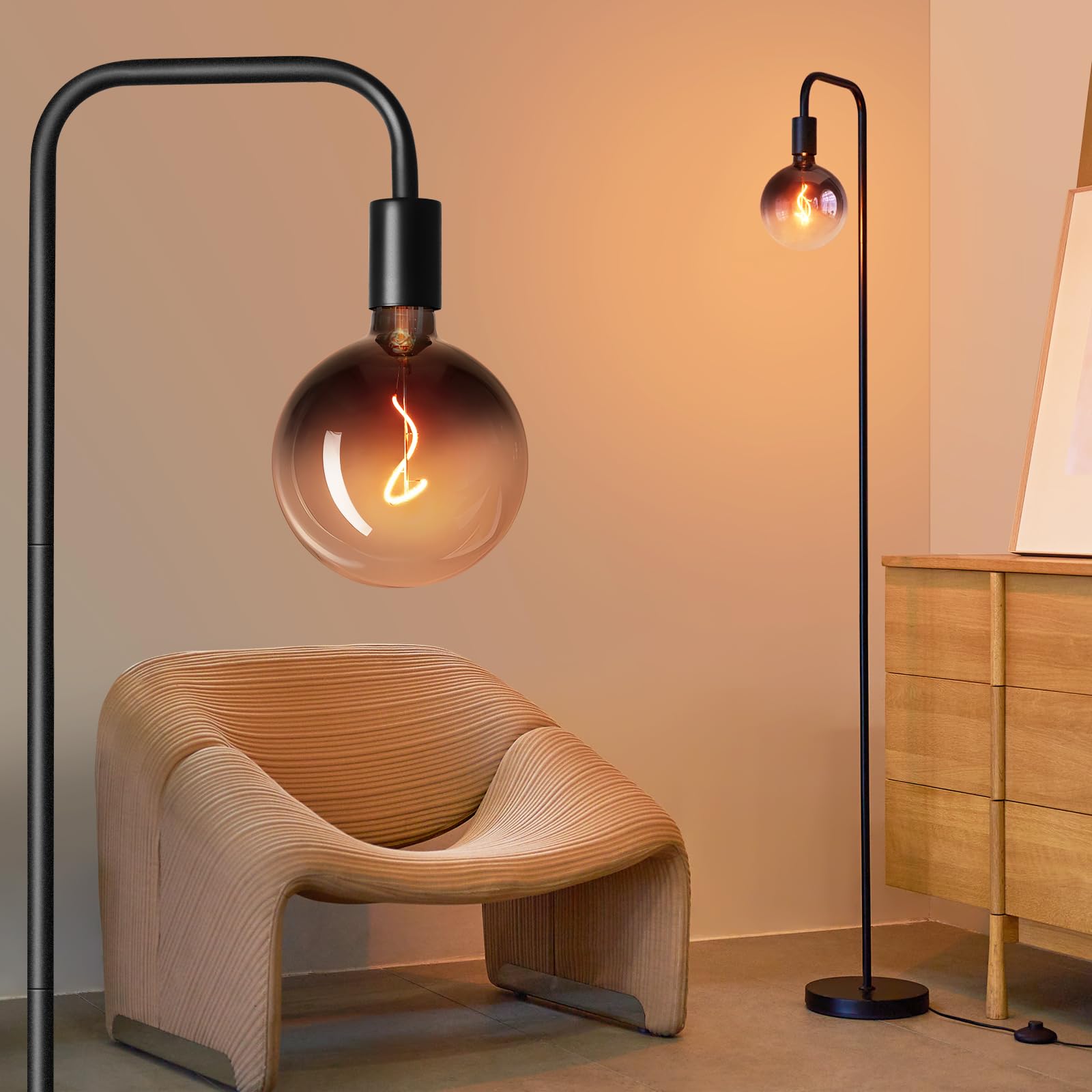 ONEWISH floor lamp with globe bulb casts warm ambient light beside a sofa