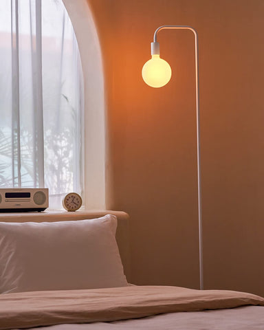 ONEWISH hand-blown frosted globe bulb adds decorative charm to spaces.