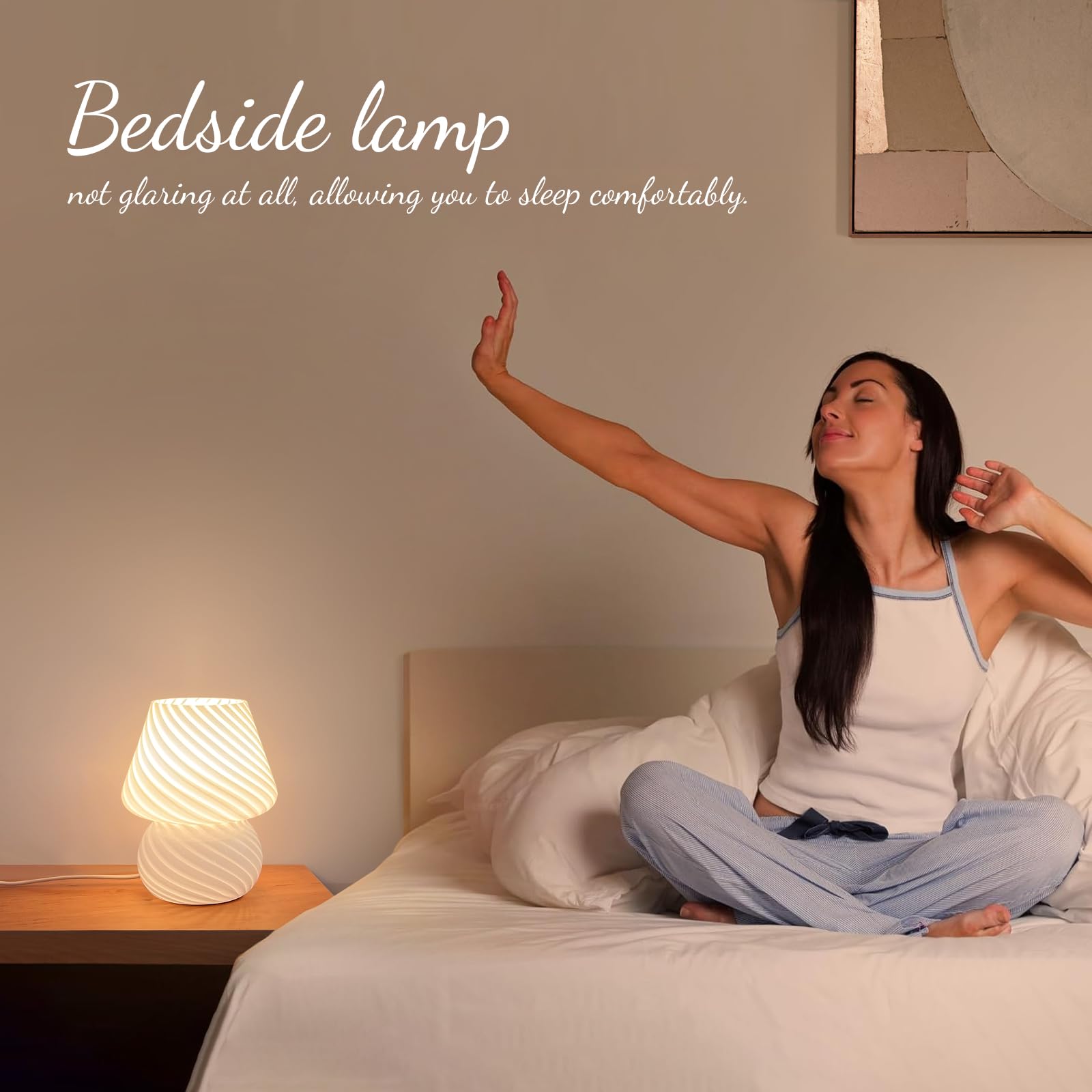 ONEWISH hand-blown bedside lamp adds unique character with soft illumination.
