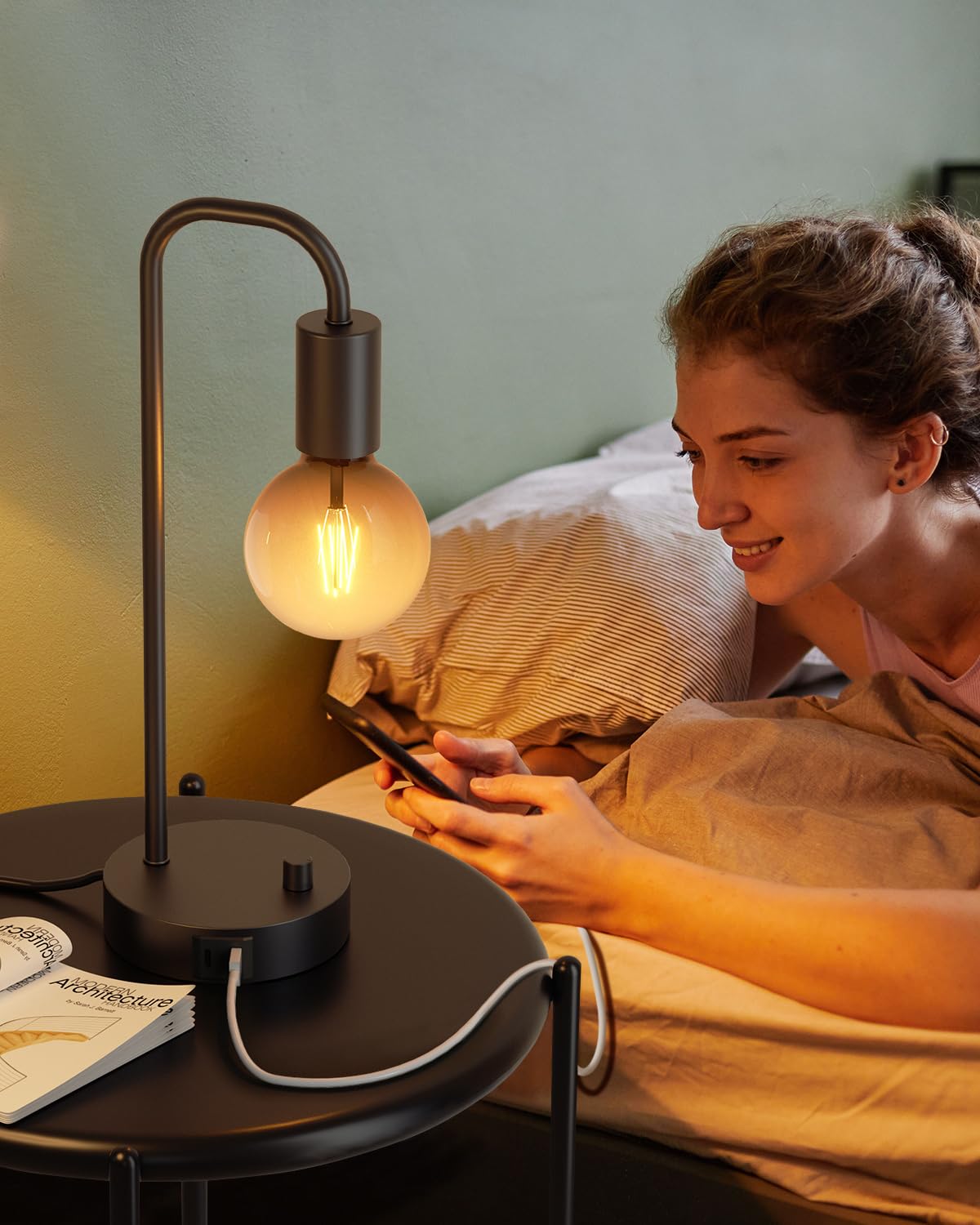 ONEWISH bedside lamps create cozy mood while charging devices.
