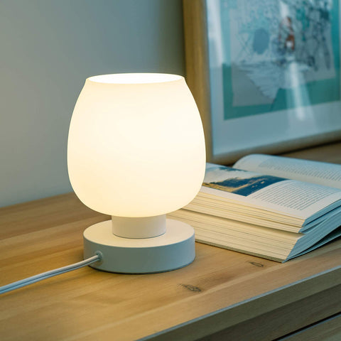 ONEWISH Touch bedside lamp demonstrating 3-way dimming with subtle glow.