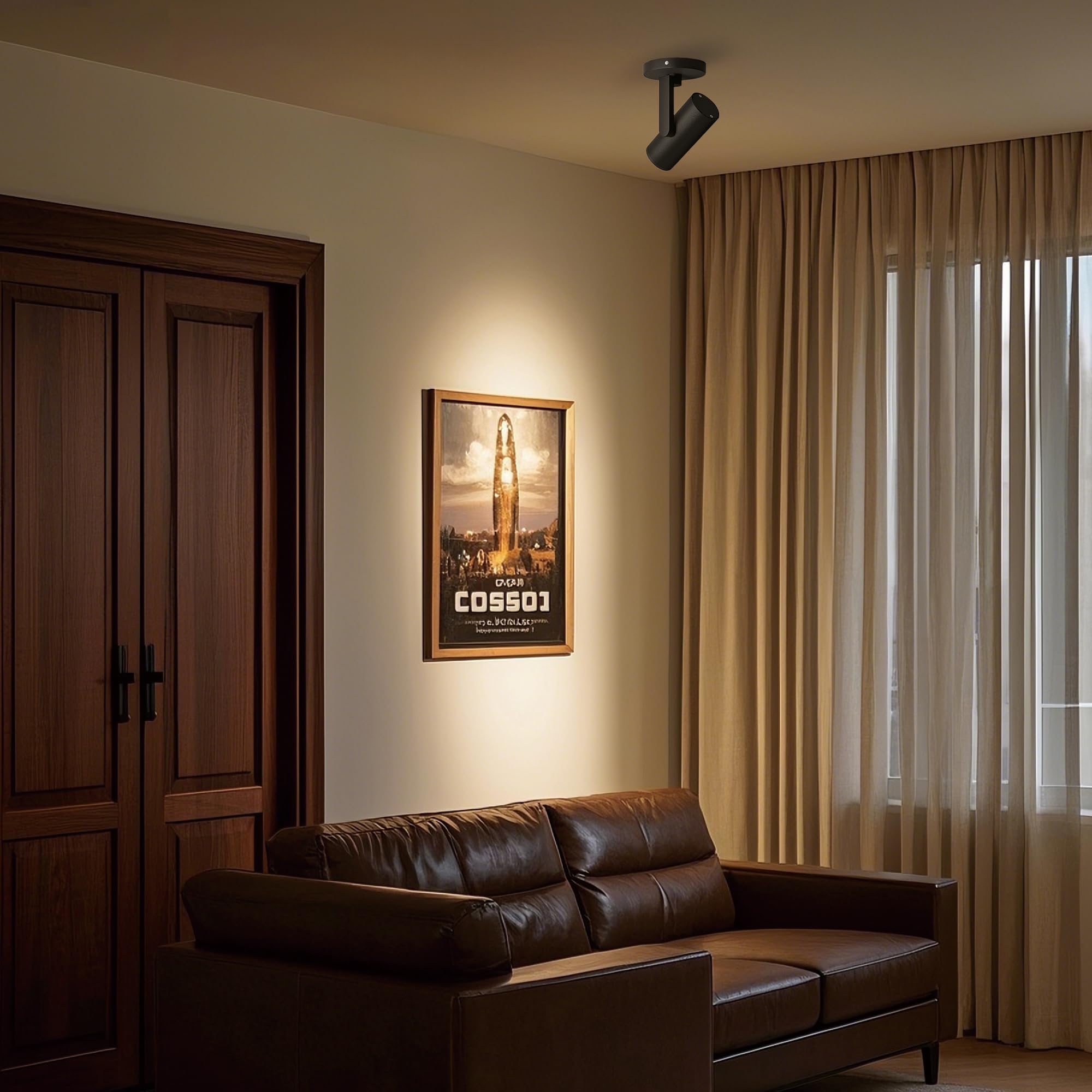 Black Opulux ceiling spotlight blends with contemporary interiors for focal lighting.