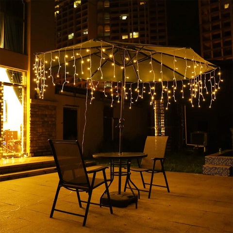 Orangie LED Icicle Lights closeup drops showing crystal glow and varied lengths.