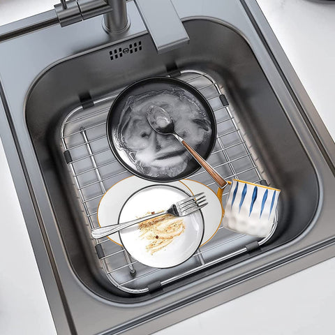 Orgneas sink grid improves drainage by letting water flow beneath dishes