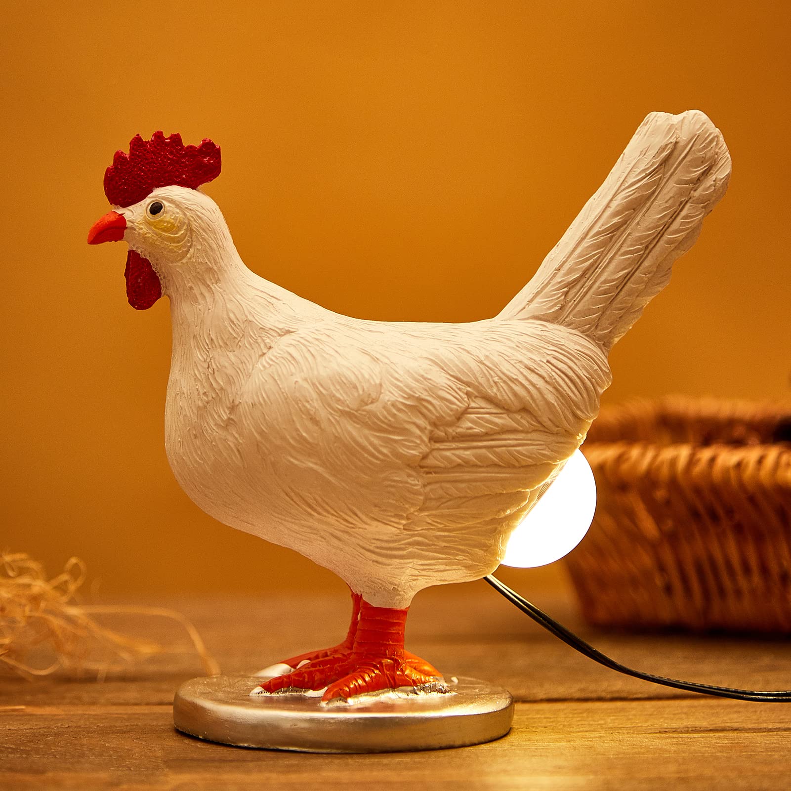 Oriamde chicken egg lamp bronze glowing egg on bedside table for cozy ambiance