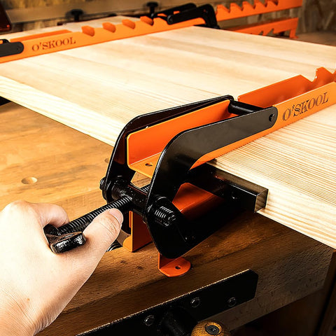 O'SKOOL 4-way panel clamp in use prevents bowing.
