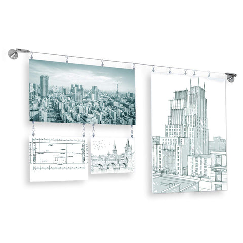 OTTFF suspension setup shows photos and art held securely on a wall.