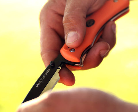 OUTDOOR EDGE RazorPro G black nylon sheath protects knife and blades