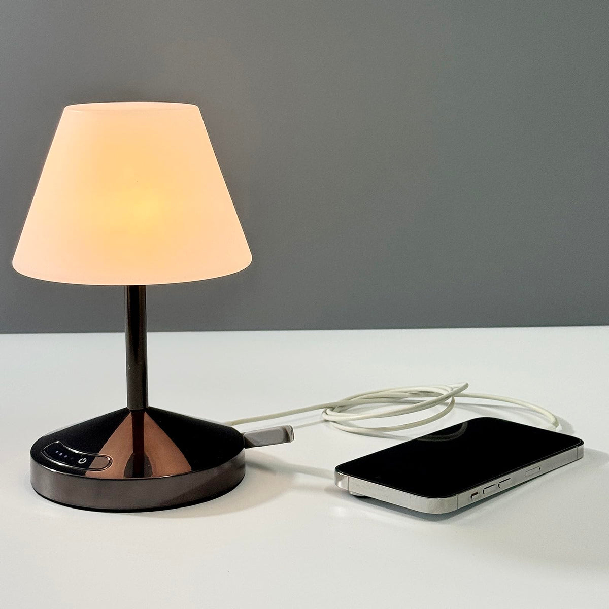 OUTON rechargeable LED shower lamp, angle view, versatile bathroom lighting.