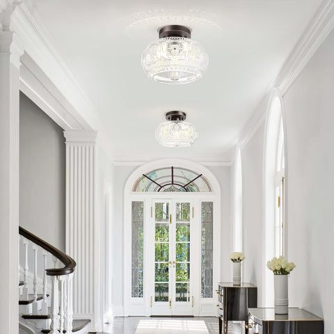 OYKYOHEI globe glass shade on bronze-gold fixture adds vintage-modern charm.
